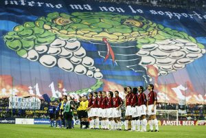 AC Milan and Inter Milan line up prior to kick off