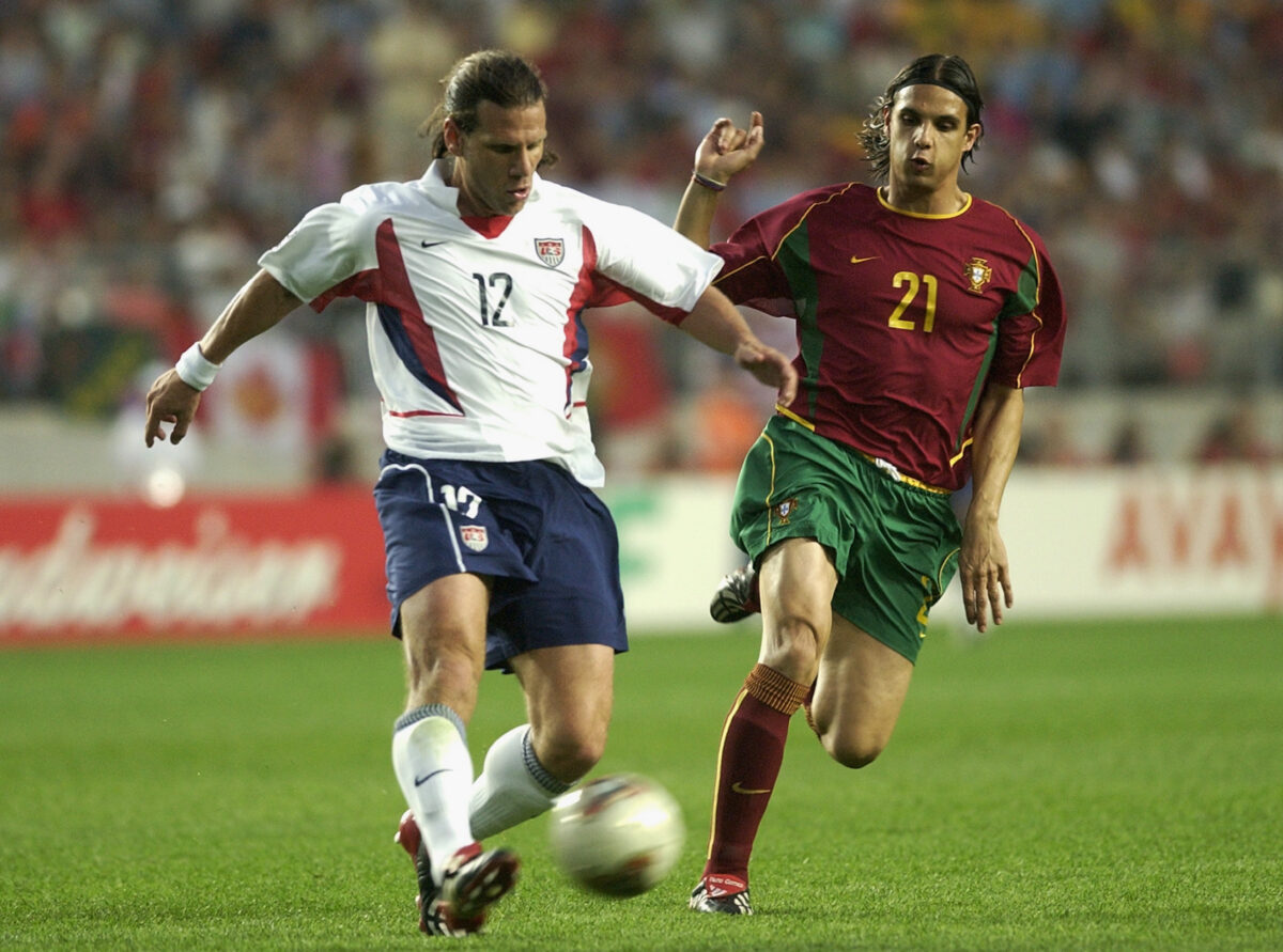 Nuno Gomes of Portugal and Jeff Agoos of USA