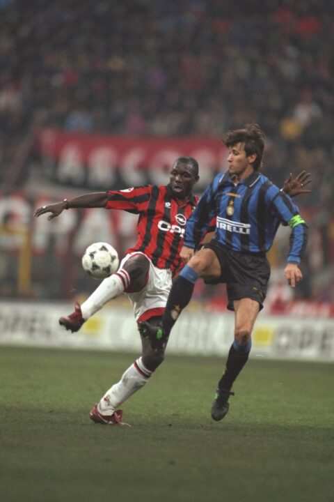George Weah of Milan (left) is challenged by Massimo Paganin of Inter George Weah of Milan (left) is challenged by Massimo Paganin of Inter