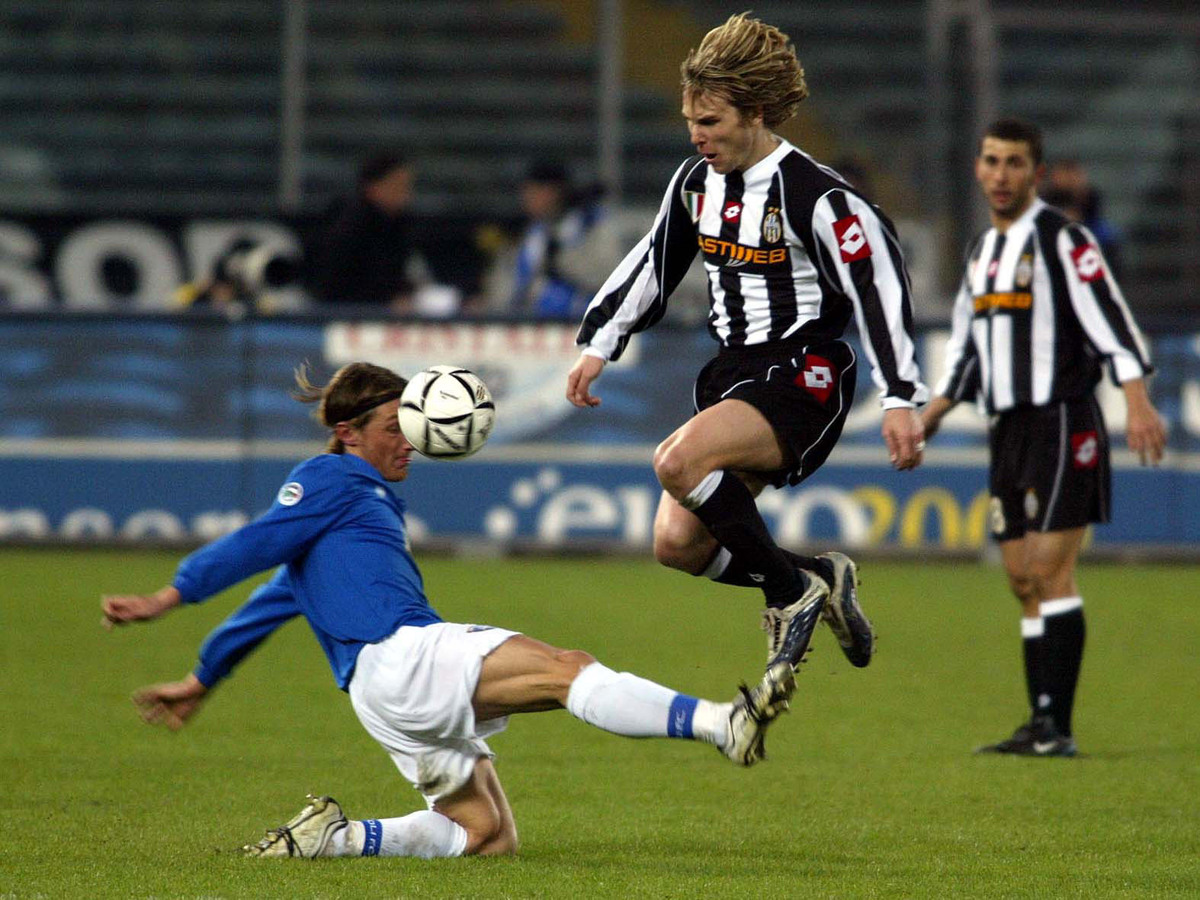 Pavel Nedved of Juventus and Manuel Belleri of Empoli  in action